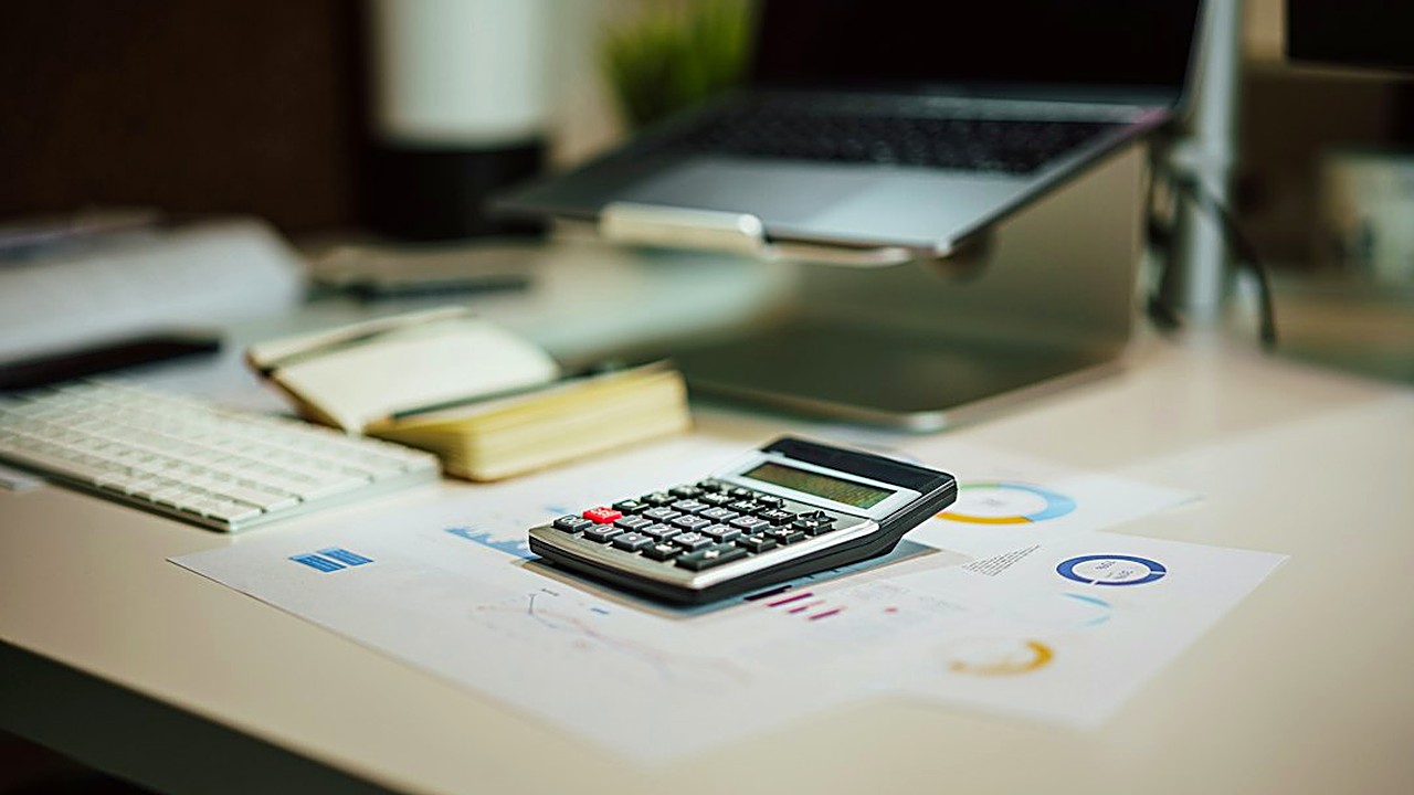 Step-by-step math for capital gains tax on index fund sales: cost basis, reinvested dividends, short vs long-term…