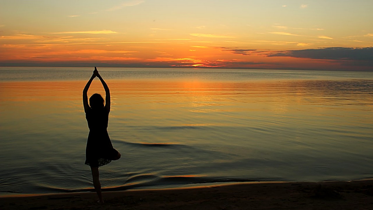 Find simple yoga poses to help reduce tinnitus and calm your ears